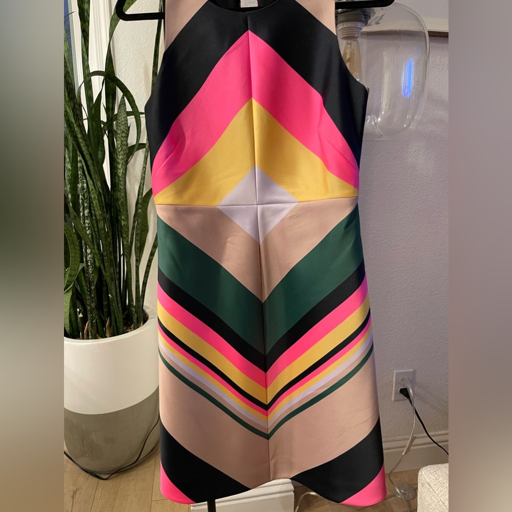 Below the knee dress, zipper and button closure in back, lined